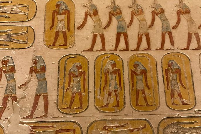 Ancient Egyptian hieroglyphs on a wall