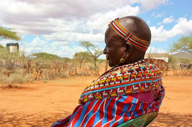 Woman in colorful Kenyan dress